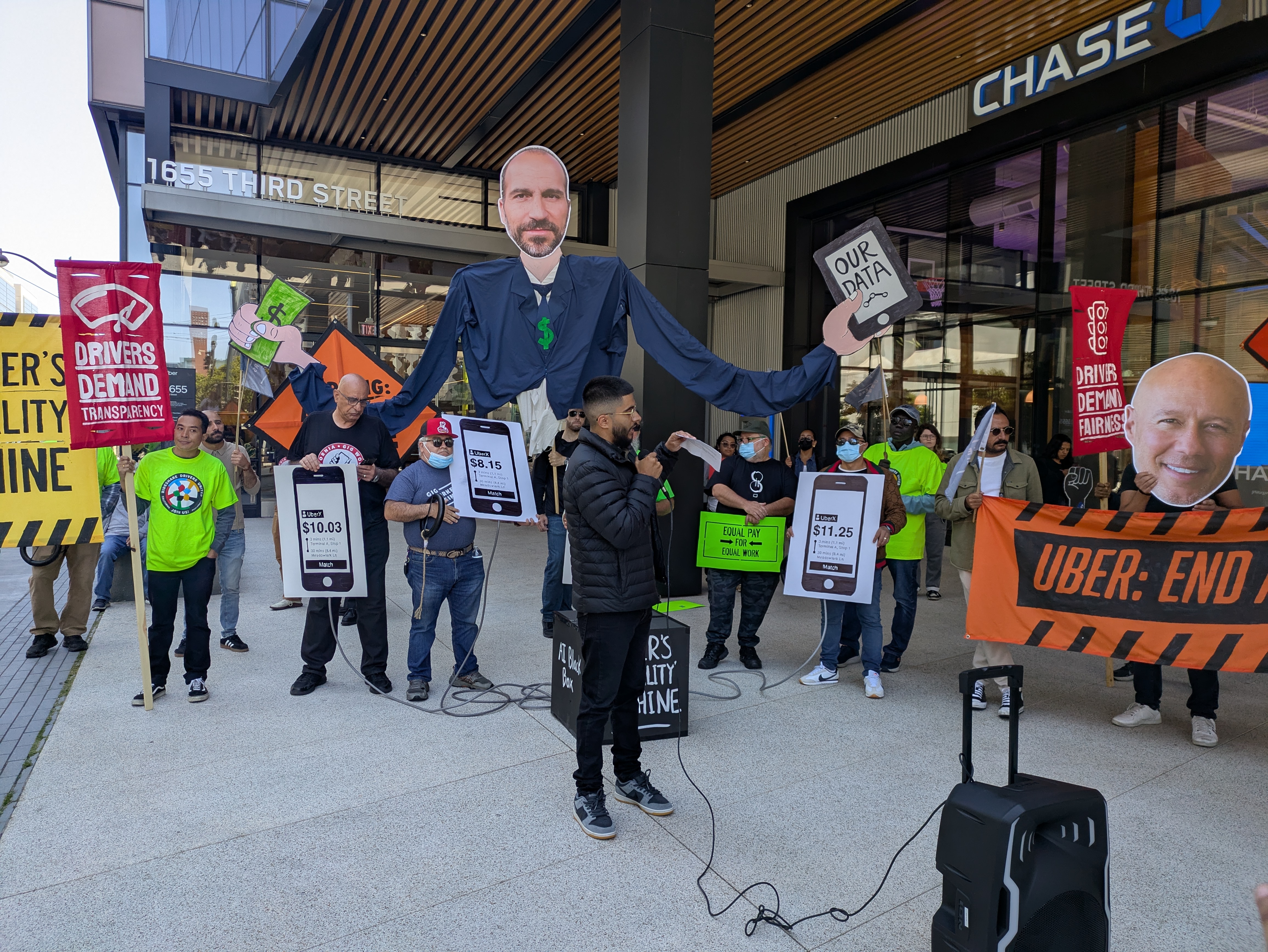 Workers demonstrating with protest signs